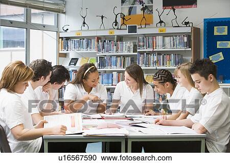 Students in a study group collaborating View Large Photo Image Stock Image - Students in a study group collaborating. Fotosearch