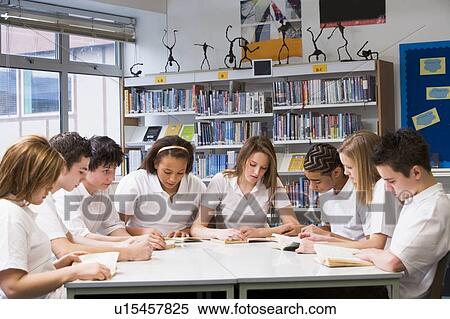 Students in a study group collaborating View Large Photo Image Stock Photography - Students in a study group collaborating. Fotosearch