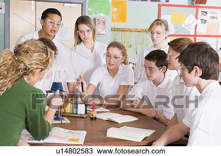 Students receiving chemistry lesson in classroom View Large Photo Image Stock Image - Students receiving chemistry lesson in classroom. Fotosearch