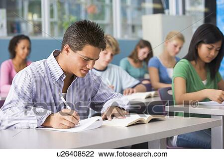 Stock Image - Students studying in geography class. Fotosearch