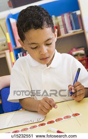 Student in class learning numbers (selective focus) View Large Photo Image Stock Image - Student in class learning numbers (selective focus). Fotosearch