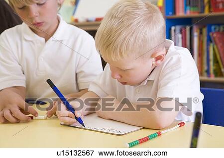 Students in class learning numbers (selective focus) View Large Photo Image Stock Photo - Students in class learning numbers (selective focus). Fotosearch