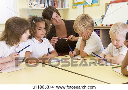 Picture - Students in math class with teacher. Fotosearch