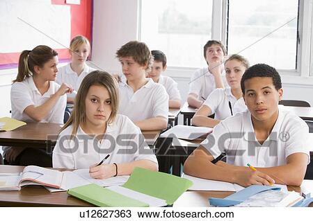 Secondary school students in a classroom View Large Photo Image Stock Image - Secondary school students in a classroom. Fotosearch