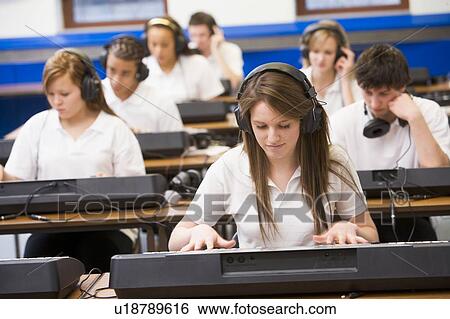 Students in music class working on keyboards View Large Photo Image Stock Photograph - Students in music class working on keyboards. Fotosearch