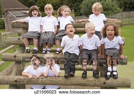 Students outdoors on wooden structure shouting View Large Photo Image Stock Image - Students outdoors on wooden structure shouting. Fotosearch