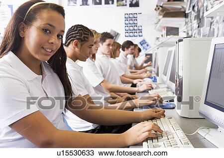 Students working on computer workstations View Large Photo Image Stock Image - Students working on computer workstations. Fotosearch