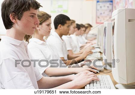 Students working on computer workstations View Large Photo Image Stock Image - Students working on computer workstations. Fotosearch