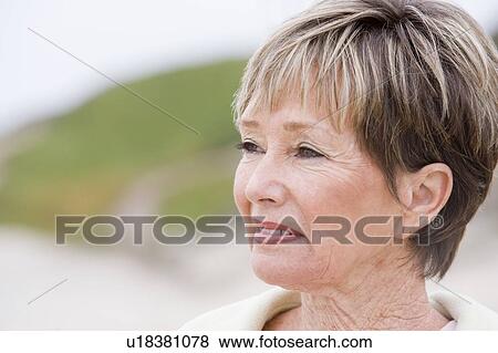 Woman at the beach View Large Photo Image Stock Photo - Woman at the beach. Fotosearch