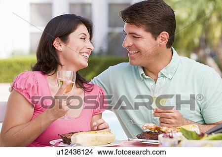 Family Enjoying A Barbeque View Large Photo Image Picture - Family Enjoying A Barbeque. Fotosearch