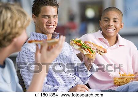 Picture - Students having lunch. Fotosearch