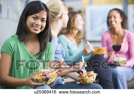 Stock Photograph - Students having lunch. Fotosearch