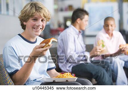 Stock Photography - Students having lunch. Fotosearch