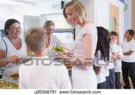 Stock Photo - Students in cafeteria line with teacher at lunchtime. Fotosearch