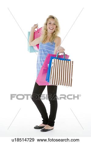 Stock Photo - Teenage Girl Showing Off Her Shopping. Fotosearch