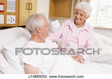 Senior Woman Visiting Her Husband In Hospital View Large Photo Image Stock Photography - Senior Woman Visiting Her Husband In Hospital. Fotosearch