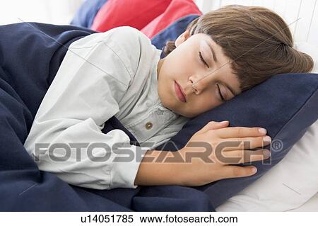 Young Boy Asleep In His Bed View Large Photo Image Stock Photography - Young Boy Asleep In His Bed. Fotosearch