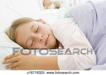 Young Girl Asleep In Her Bed View Large Photo Image Stock Photography - Young Girl Asleep In Her Bed. Fotosearch