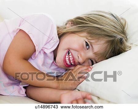 Young Girl Lying In Her Bed View Large Photo Image Stock Image - Young Girl Lying In Her Bed. Fotosearch