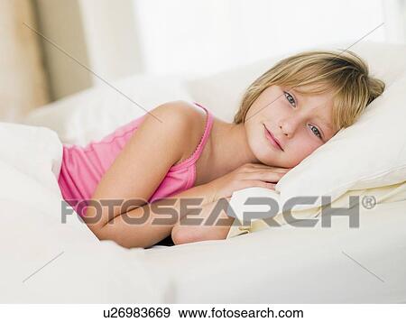 Young Girl Lying In Her Bed View Large Photo Image Stock Photo - Young Girl Lying In Her Bed. Fotosearch
