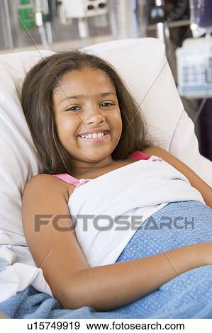 Young Girl Lying In Hospital Bed View Large Photo Image Stock Photo - Young Girl Lying In Hospital Bed. Fotosearch