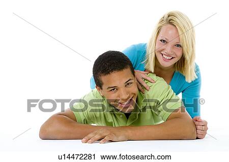 Stock Image - Portrait Of Teenage Couple. Fotosearch