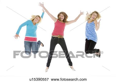 Stock Photo - Teenage Girls Jumping In The Air. Fotosearch