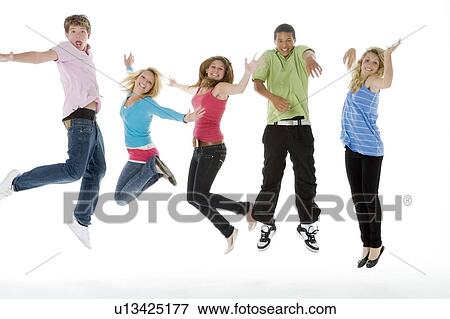 Stock Photo - Teenagers Jumping In The Air. Fotosearch