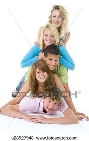 Stock Photo - Teenagers On Top Of One Another. Fotosearch