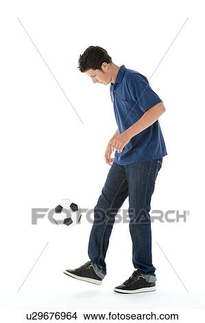 Picture - Portrait Of Teenage Boy With A Soccer Ball. Fotosearch