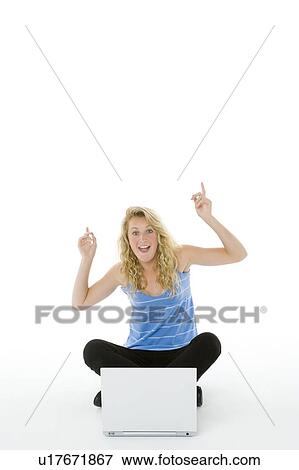 Stock Photo - Portrait Of Teenage Girl On Her Laptop. Fotosearch