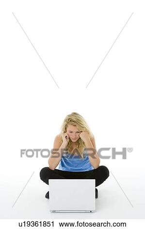 Stock Image - Portrait Of Teenage Girl On Her Laptop. Fotosearch
