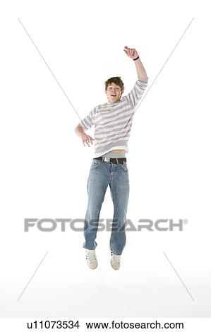Teenage Boy Jumping In The Air View Large Photo Image Picture - Teenage Boy Jumping In The Air. Fotosearch