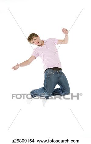 Teenage Boy Jumping In The Air View Large Photo Image Picture - Teenage Boy Jumping In The Air. Fotosearch