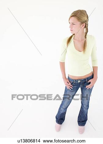 Teenage girl with hands on hips View Large Photo Image Picture - Teenage girl with hands on hips. Fotosearch