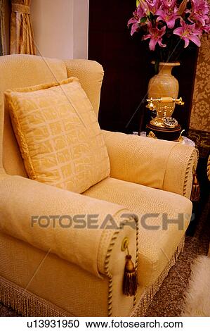 Stock Image - Close-up of a sofa and decoration. Fotosearch