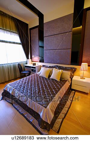 Stock Image - Home interior and furniture of the bedroom. Fotosearch