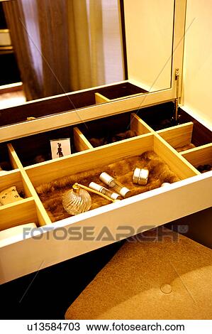 Close-up of cosmetics in the drawer View Large Photo Image Stock Image - Close-up of cosmetics in the drawer. Fotosearch