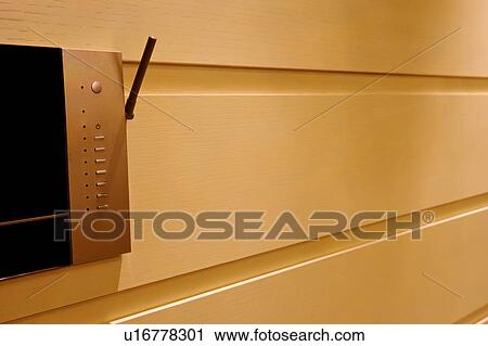 Stock Image - Close-up of video interphone on the wall. Fotosearch