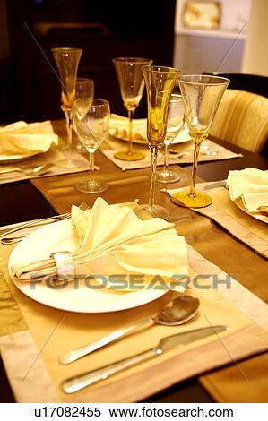 Close-up of place settings on the dining table View Large Photo Image Stock Photography - Close-up of place settings on the dining table. Fotosearch