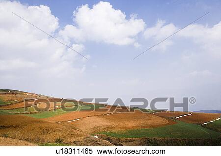Beautiful scenery of red earth in Yunnan Province, China View Large Photo Image Stock Photography - Beautiful scenery of red earth in Yunnan Province, China. Fotosearch
