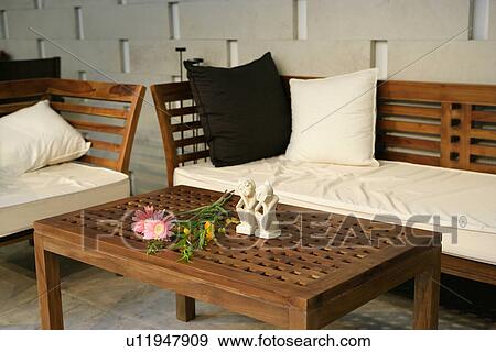Stock Photo - Home decorating of living room with wooden furnitures. Fotosearch