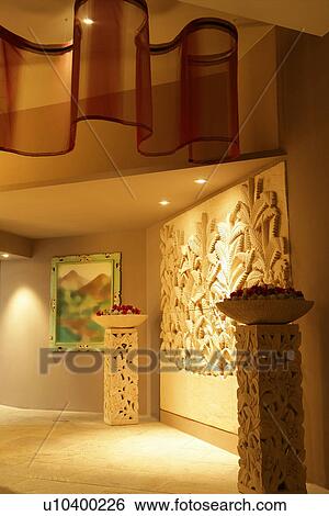 Stock Photograph - Home decorating of wall carving and carved sculptures. Fotosearch