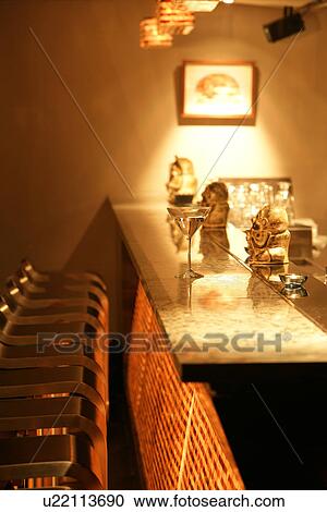 Interiors-leisure space of bar counter in western restaurant with luxury style View Large Photo Image Stock Image - Interiors-leisure space of bar counter in western restaurant with luxury style. Fotosearch