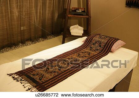 Massage bed with sheet and pillow for healthy lifestyle View Large Photo Image Stock Image - Massage bed with sheet and pillow for healthy lifestyle. Fotosearch