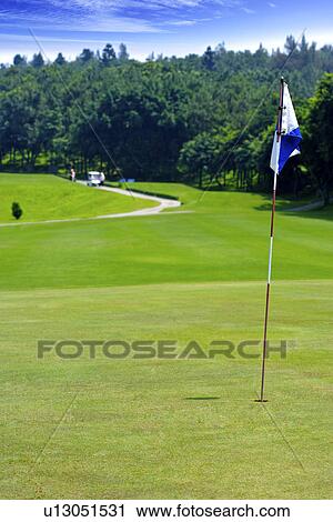 Flag in golf course View Large Photo Image Stock Image - Flag in golf course. Fotosearch