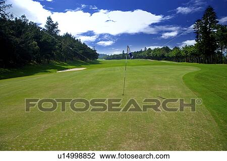 Flag in golf course View Large Photo Image Stock Image - Flag in golf course. Fotosearch
