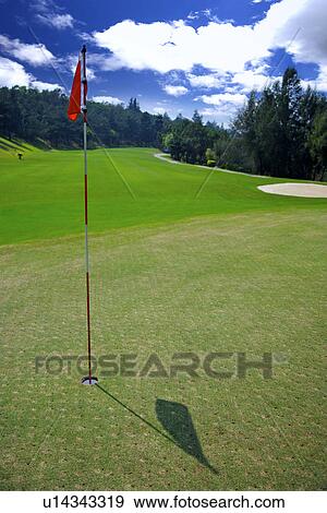 Flag in golf course View Large Photo Image Stock Photo - Flag in golf course. Fotosearch