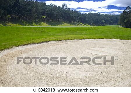 Golf course with sand traps View Large Photo Image Stock Photo - Golf course with sand traps. Fotosearch