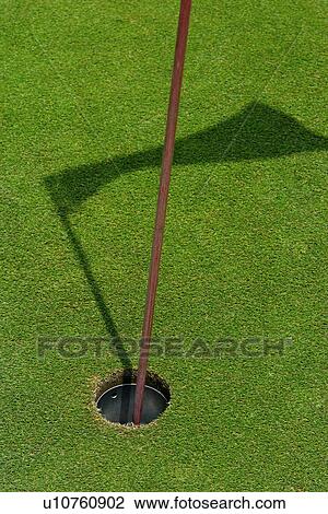Stock Image - Hole on Golf Course. Fotosearch